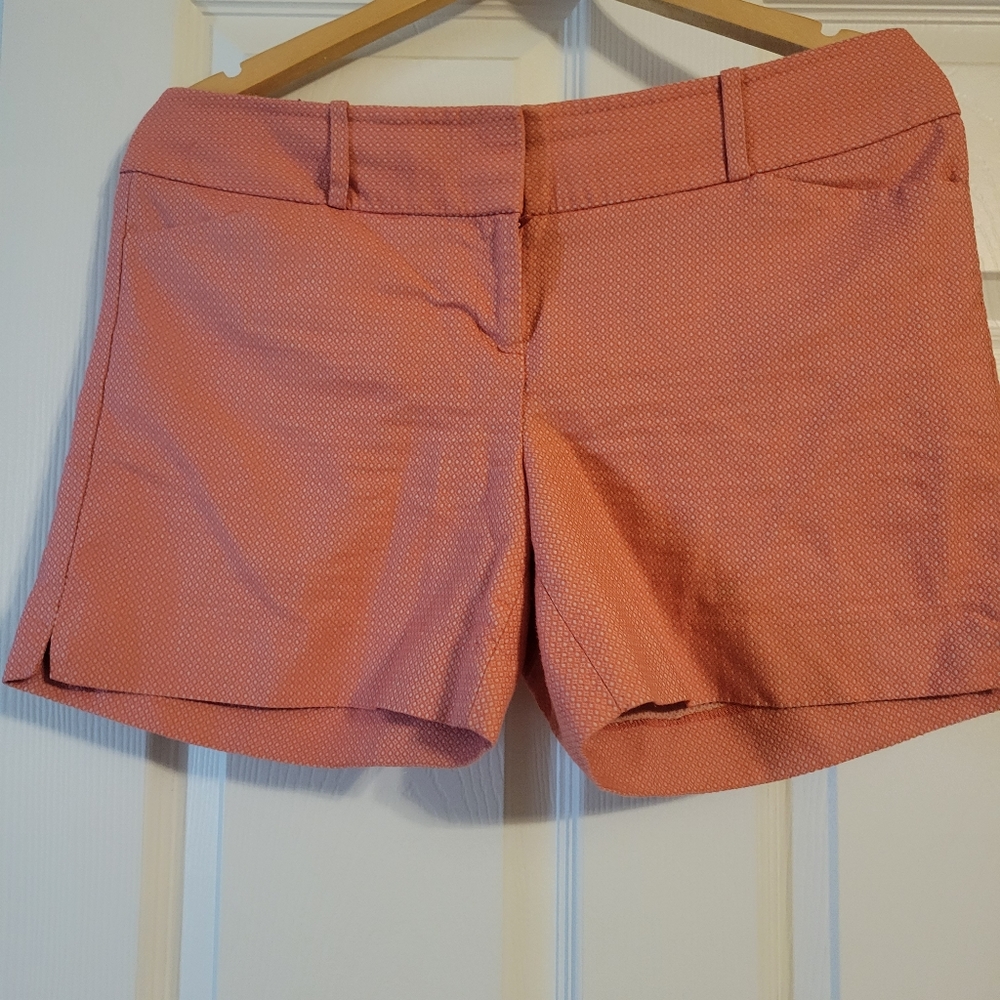 Reddish orange and tan shorts
